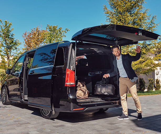 Passenger van rear compartment loaded with luggage